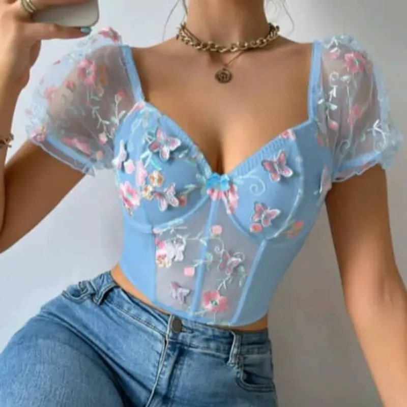 Top azul con mariposas 3d