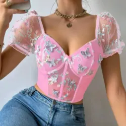 Top rosado con mariposas 3d