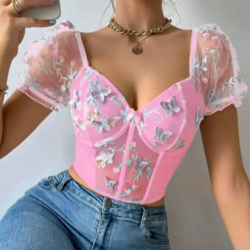 Top rosado con mariposas 3d