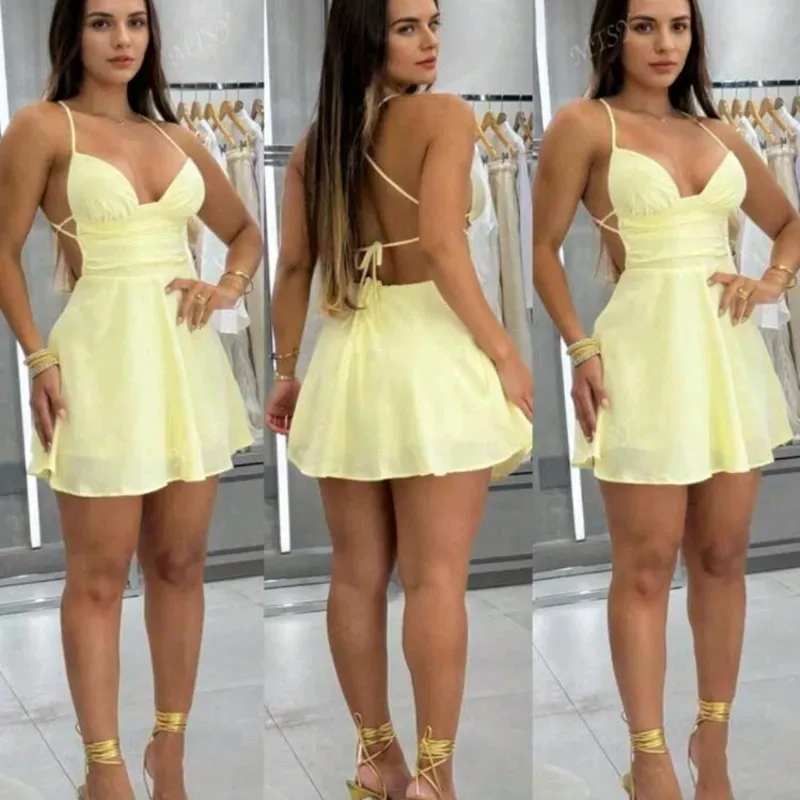 Vestido corto amarillo con espalda descubierta 