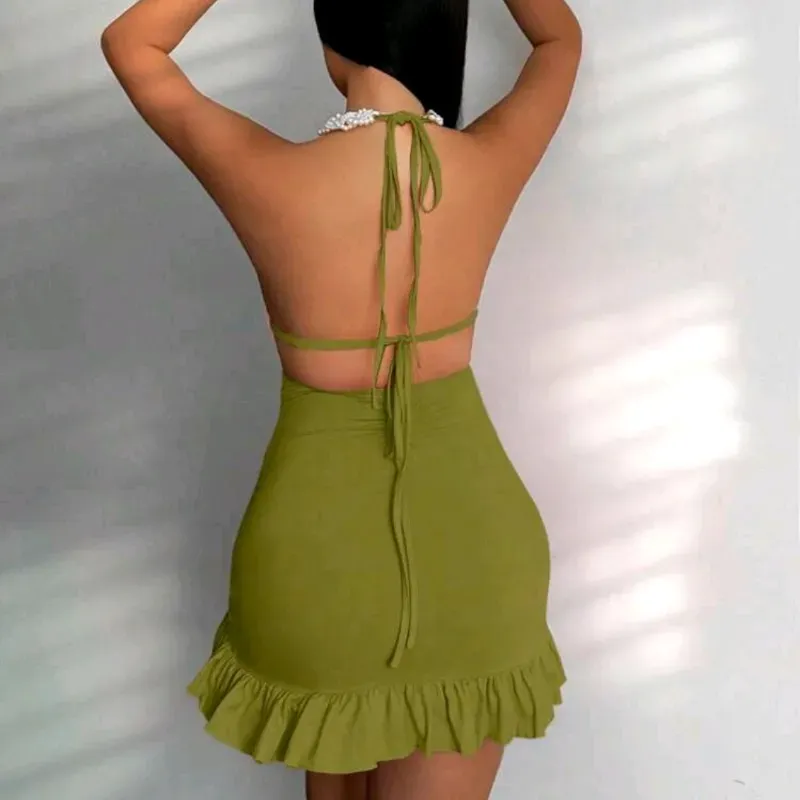 Vestido verde espalda afuera y vuelo