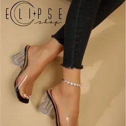 Zapatos altos de tacón trasparente