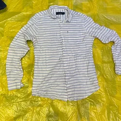 Camisa de rayas azul y blanco