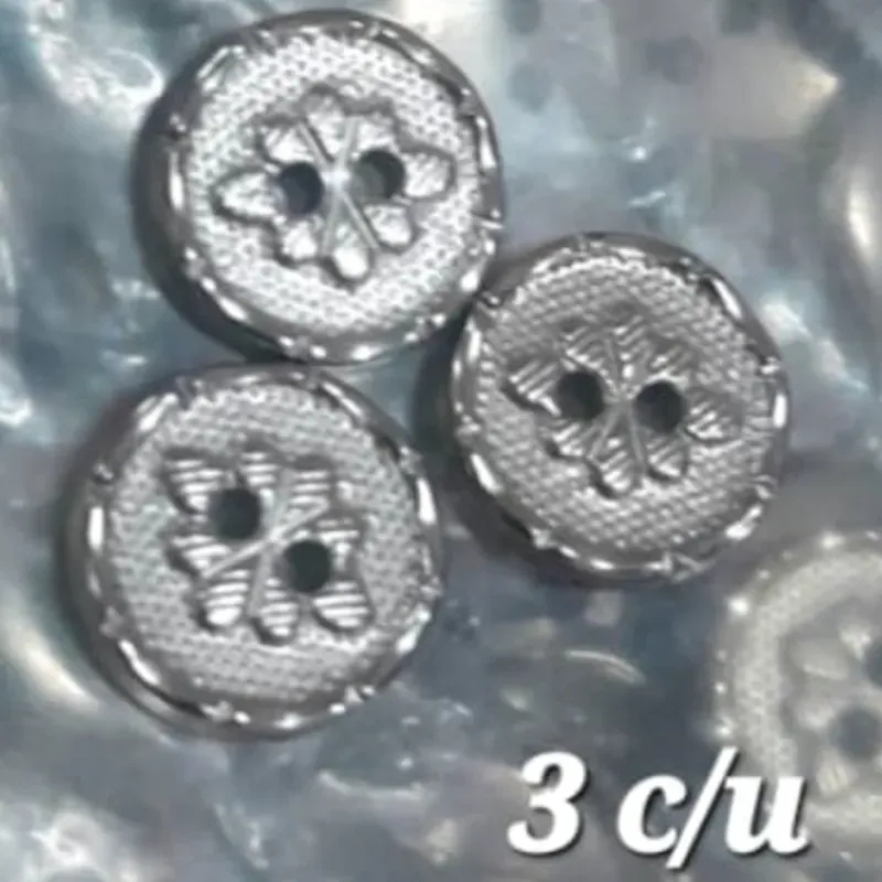 Botón metal