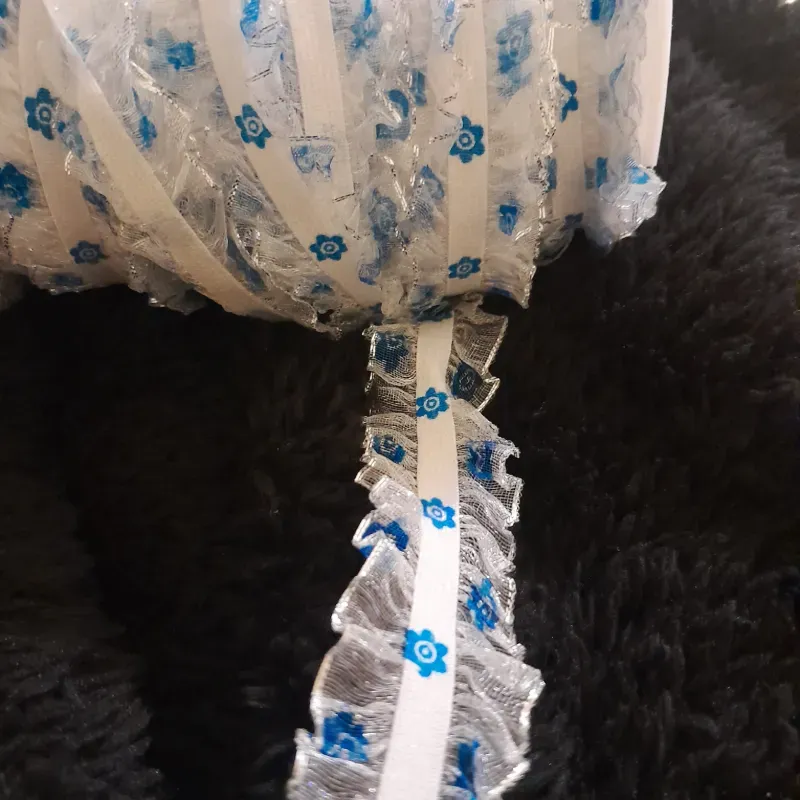 Punta elástica con flor azul