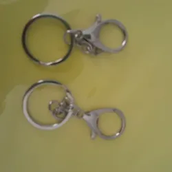 Herrajes lleveros metálicos  con broche de perico