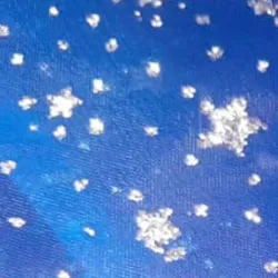 Organza azul adornada con estrellas plata 