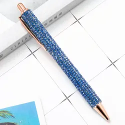 Bolígrafo con diamantes azules