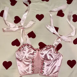 Blusa rosa con lazos
