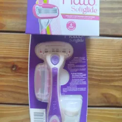 Maquina de afeitar con soporte y repuesto 