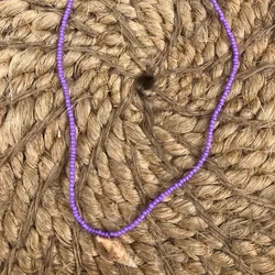 Collar de mostacillas con caracol 