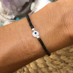 Pulsera con mostacillas y ojo turco 