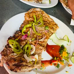 Bistec de cerdo grillé