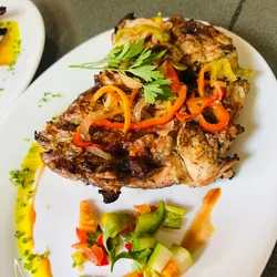 Pollo asado a la brasa 