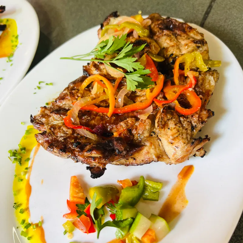 Pollo asado a la brasa 