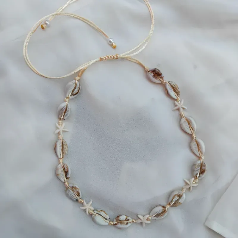 Collar de caracolas y 5 estrellas de mar