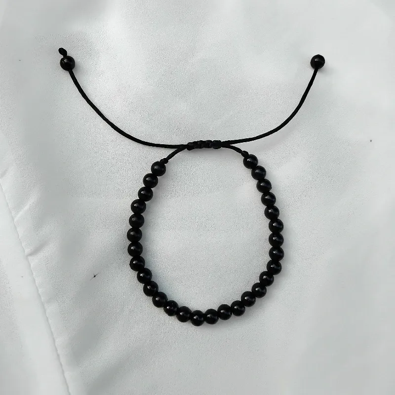 De perlas, ajustable.