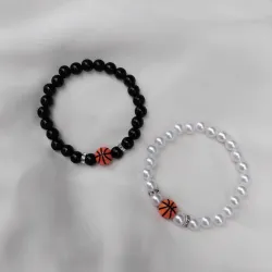 Pareja de pulseras con pelota de basquet