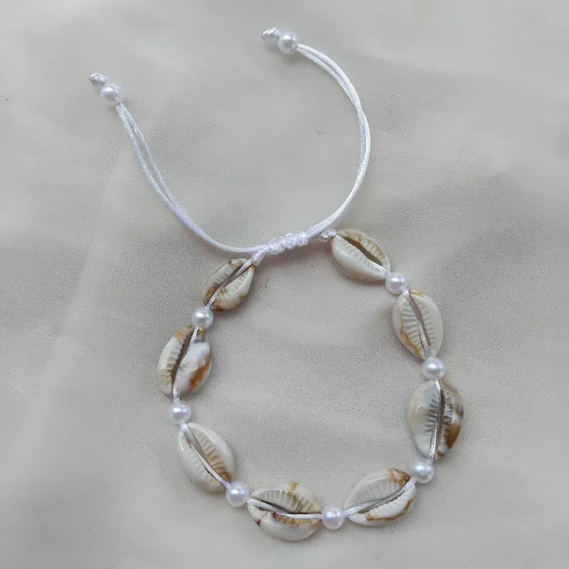 Tobillera de caracolas