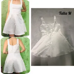 Vestido blanco de lazos