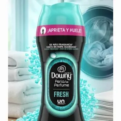 Detalles: Downy Perlas de Perfume - Fresh (Frasco Derecho) ​Color distintivo: Tapa y detalles en color verde agua o turquesa. ​Fragancia: Aroma fresco, limpio y refrescante. ​Idioma del empaque: Mezcla de español e inglés ("¡Aprieta y huele!", "Fresh"). ​Promesa de marca: "6X más fragancia hasta en ropa guardada". ​Contenido neto: 141 g (5.0 OZ).