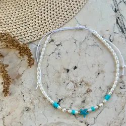 Collar con perlas de río , fimos y estrellas d mar 
