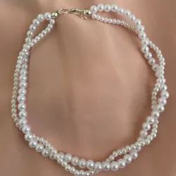 Collar de perlas blancas doble 