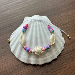 Pulsera de fimos , caracoles y accesorios veraniegos