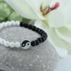 Pulseras de perlas con ying yang 