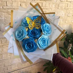 Ramo de 7 rosas eternas con 5 bombones Ferrero Rocher