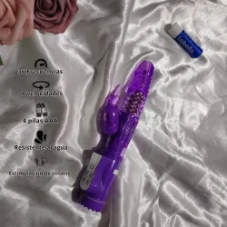 Vibrador morado giratorio a pilas