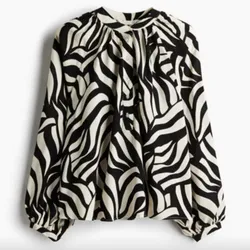 Blusa Blanca y Negra de Mangas