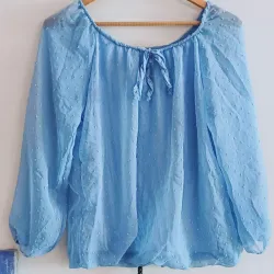 Blusa manga larga escote redondo tejido fino con forro y transparencias