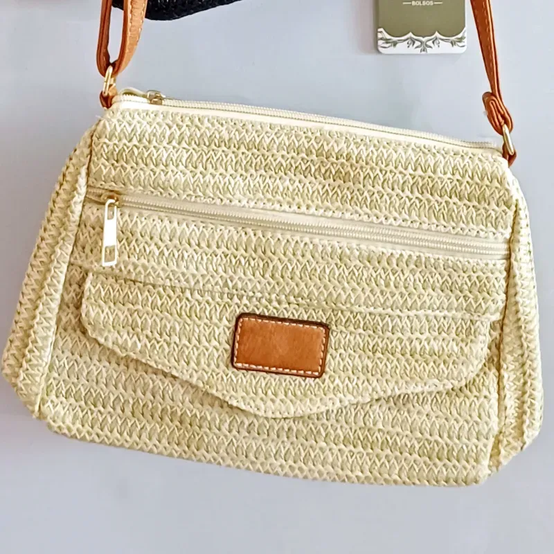Cartera bandolera mediana de rafia
