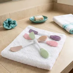 2 en 1 Espátula y cepillo exfoliante 