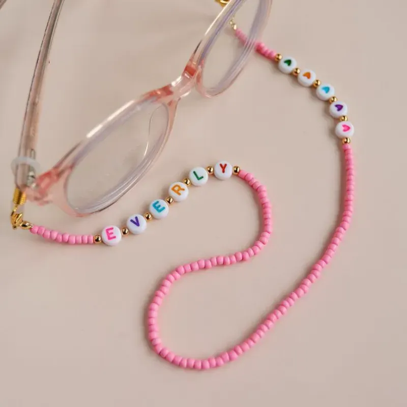 Colgante de gafas rosado