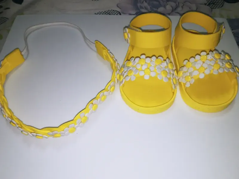 Conjunto de zapaticos y cintas para bebé