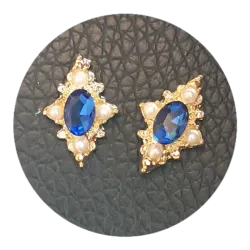 Joya dorada rombo azul