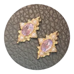 Joya dorada rombo rosa