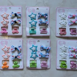 Paquete de estrellas, lazos y pellizcos