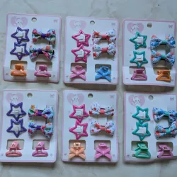 Paquete de estrellas, lazos y pellizcos