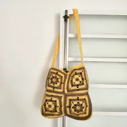 Bolso de aplicaciones amarillo 