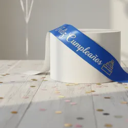 Banda "FELIZ CUMPLEAÑOS" azul con letras blancas