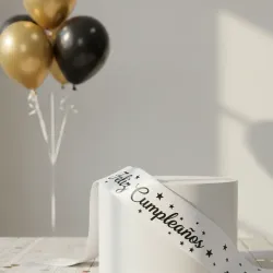 Banda "FELIZ CUMPLEAÑOS" blanca estrellada, con letras negras