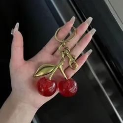 Llavero de Cherry rojo & dorado grande