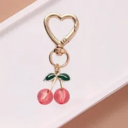Llavero de Cherry rosa y dorado pequeño 