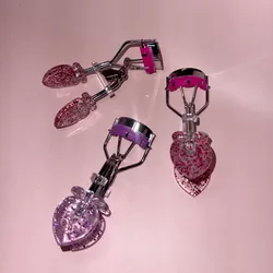 Rizadores de pestañas con brillitos
