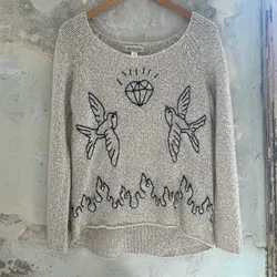 Abrigo con bordados oldschool