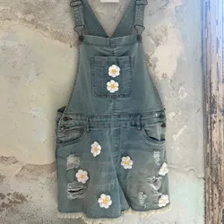 Overall flores tejidas