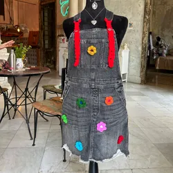 Overall con flores tejidas 